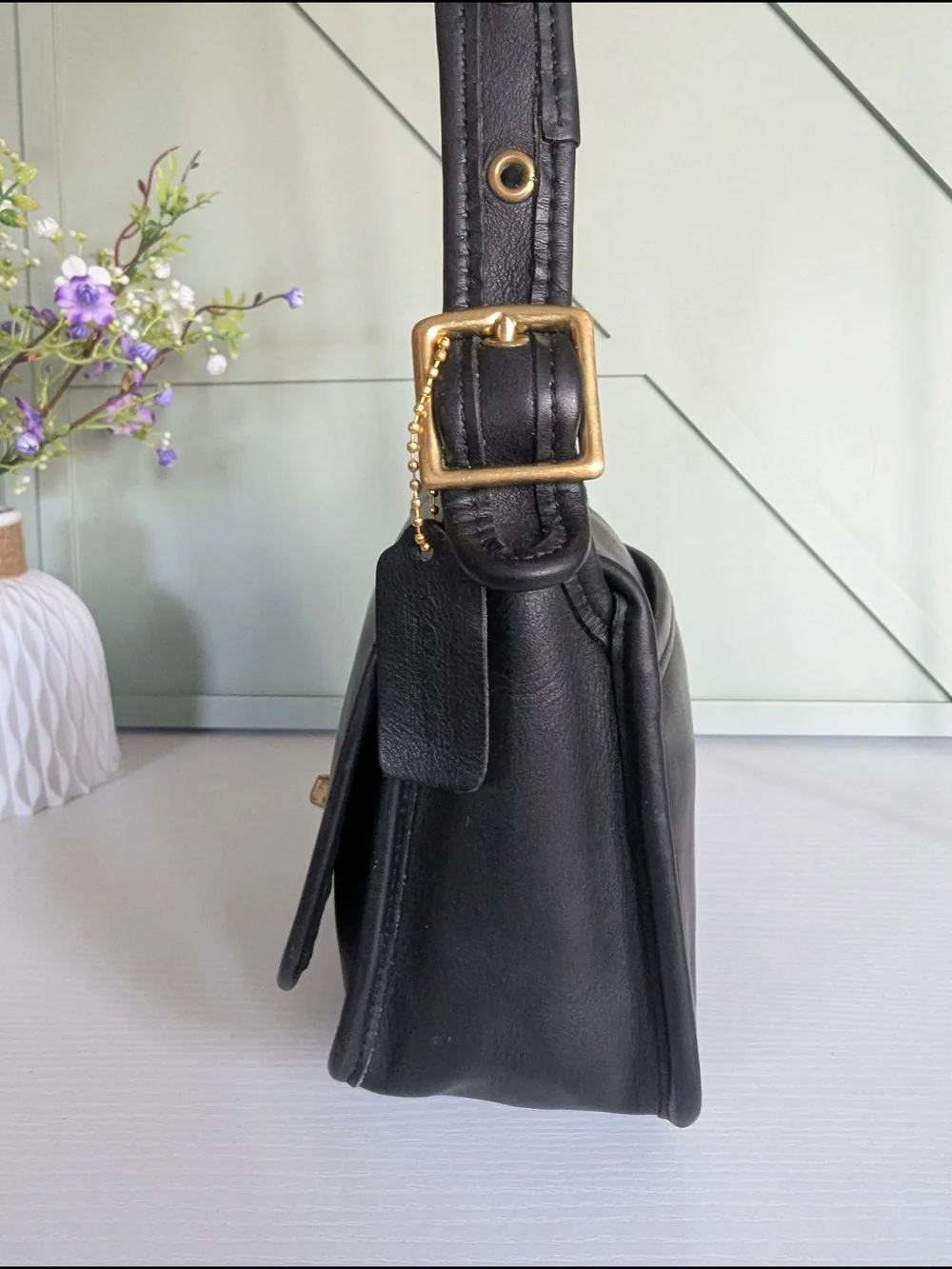 Coach Black Leather Crossbody with Gold Hardware and Cherry Charm